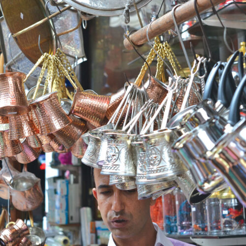 Ibriks in an outdoor market.