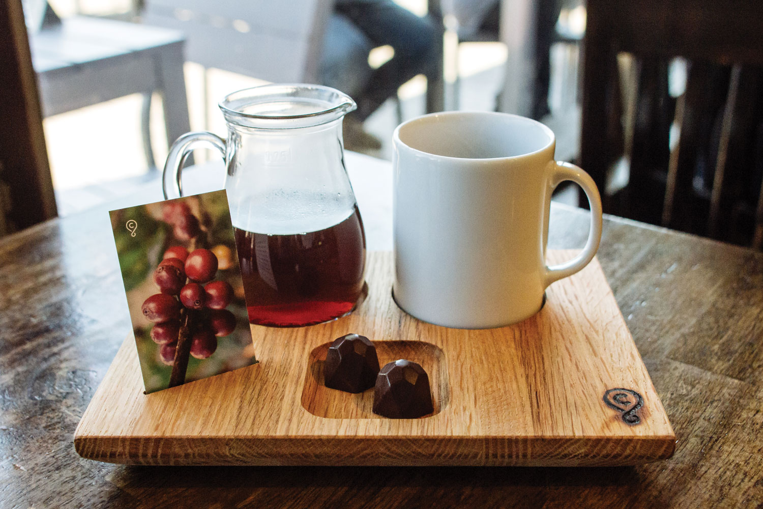 Crema's "papaya coffee" paired with locally made chocolate truffles.