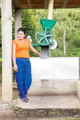 Silvia Higuita stands at her washing station. Her coffee won this year's Antioquia Best Cup competition.